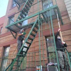 How Regular Fire Escape Painting Enhances the Durability of Your Structure