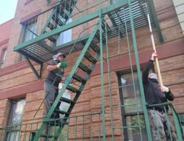 How Regular Fire Escape Painting Enhances the Durability of Your Structure